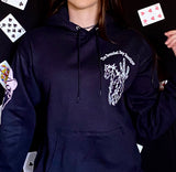 black hoodie with a horse and a pink cowboy on the sleeve