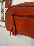 red suede bag