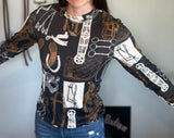 long sleeve western top with a tack print all over. 