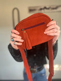 red suede bag